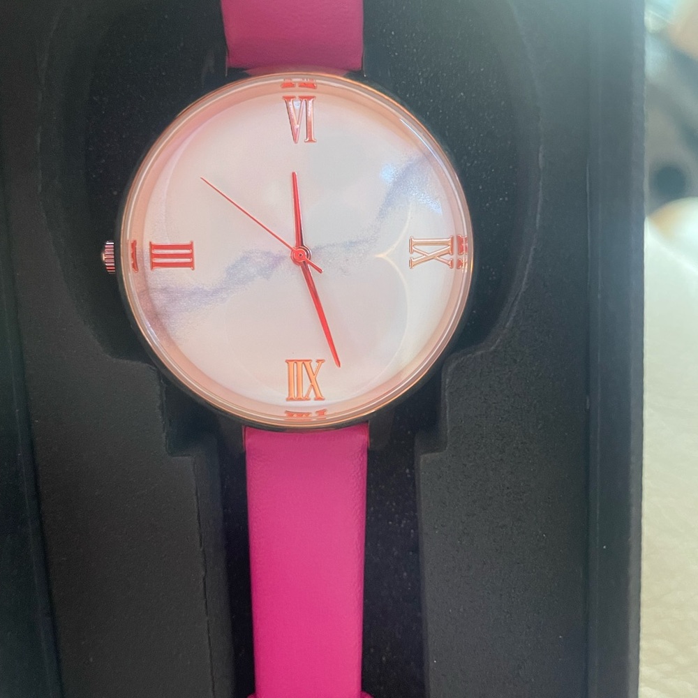 Brand new women’s hot pink gold watch